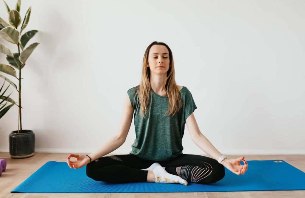 A women doing yoga - real life chiropractic in salt lake city UT